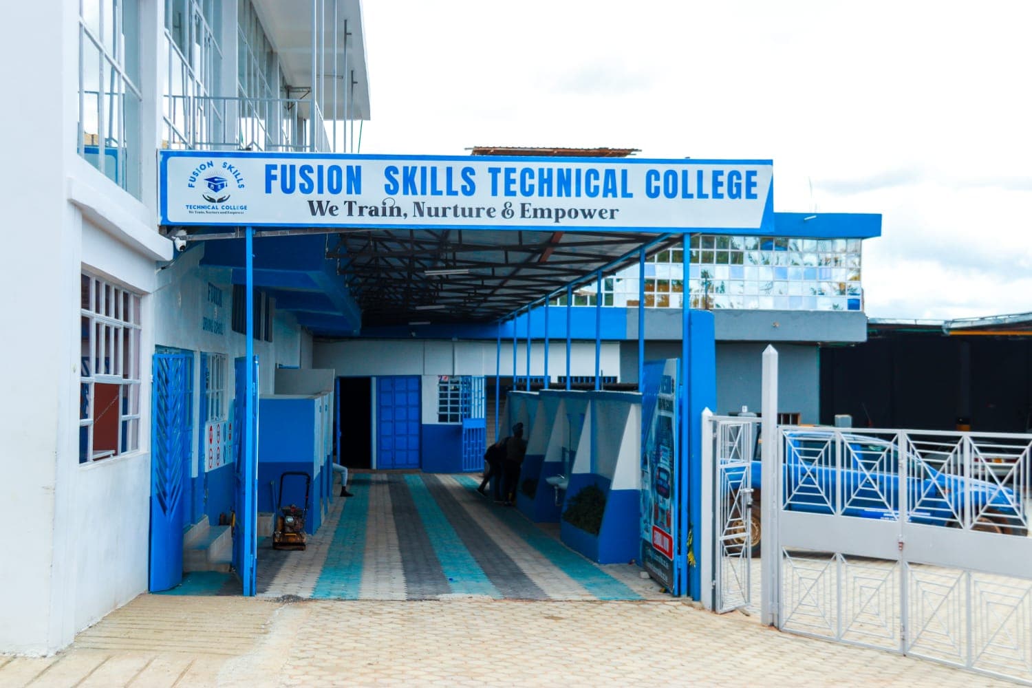 Some places speak before anyone welcomes you. The gate, the compound, the feeling.